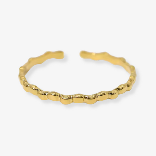 Gold bracelet on a white background