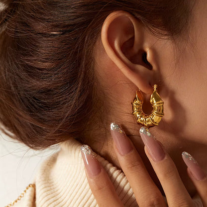 woman wearing a hoop earring