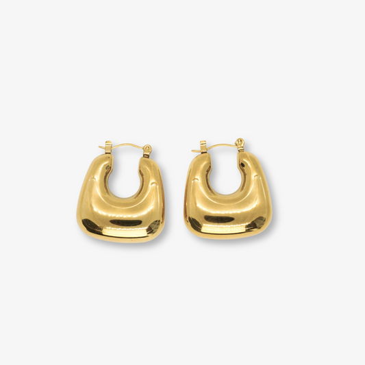 Lunara Earrings – Gold chunky hoop earrings on white background by Luzza Studio	
